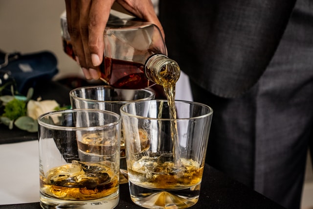 Whiskey and glasses with ice